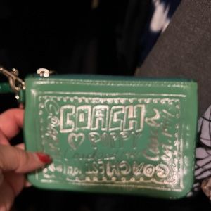 Authentic small coach wristlet great for change dollar bills and ID!